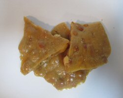 A piece of peanut brittle from the top